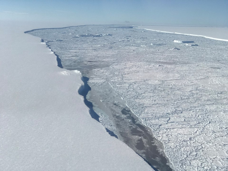 Who’s up for a swim!? Larsen C ice shelf (left) and iceberg A-68A (right). (Image: NASA/Nathan Kurtz)